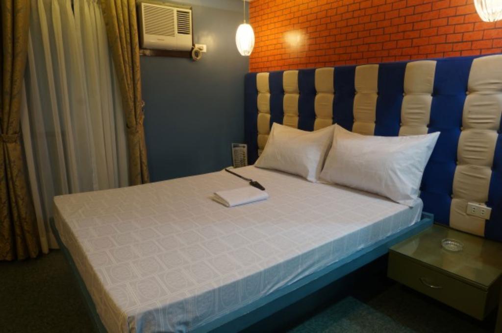 Icon Hotel Manila Quarto foto